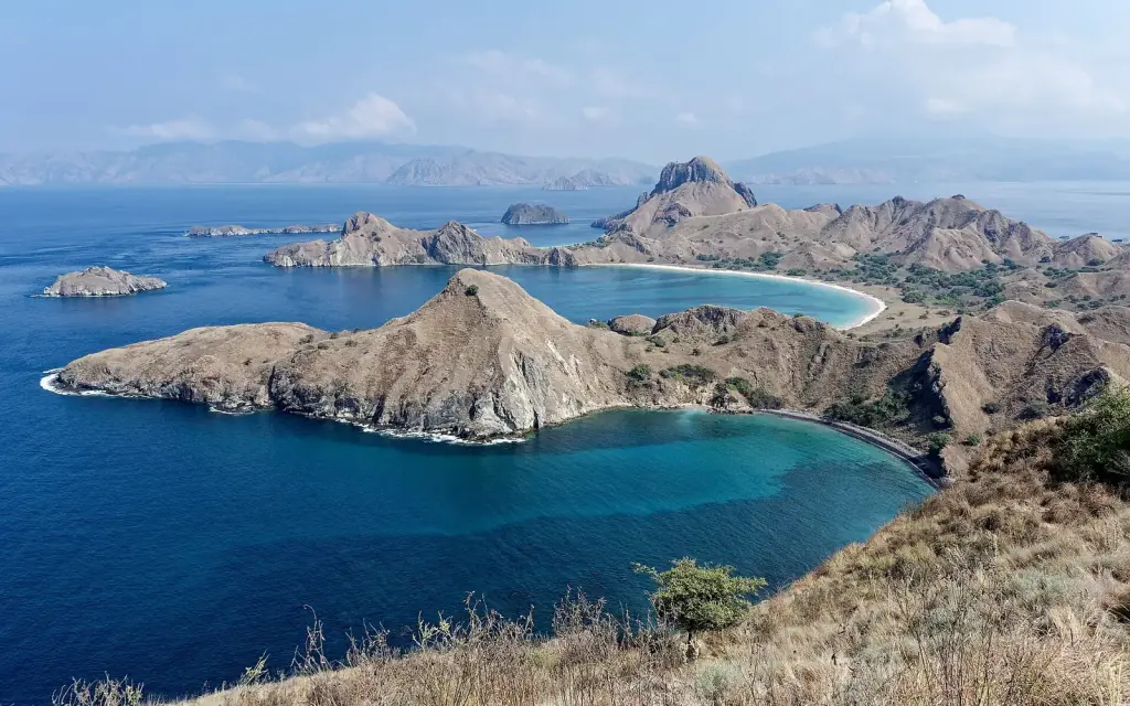 Padar Island's three bays and jagged ridges seen from the southern viewpoint, Komodo National Park.