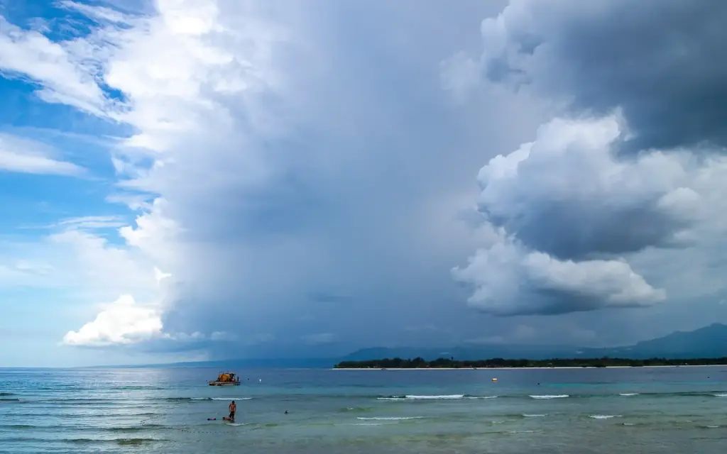 A towering cumulonimbus cloud building over the sea off the Gili Islands, West Nusa Tenggara.